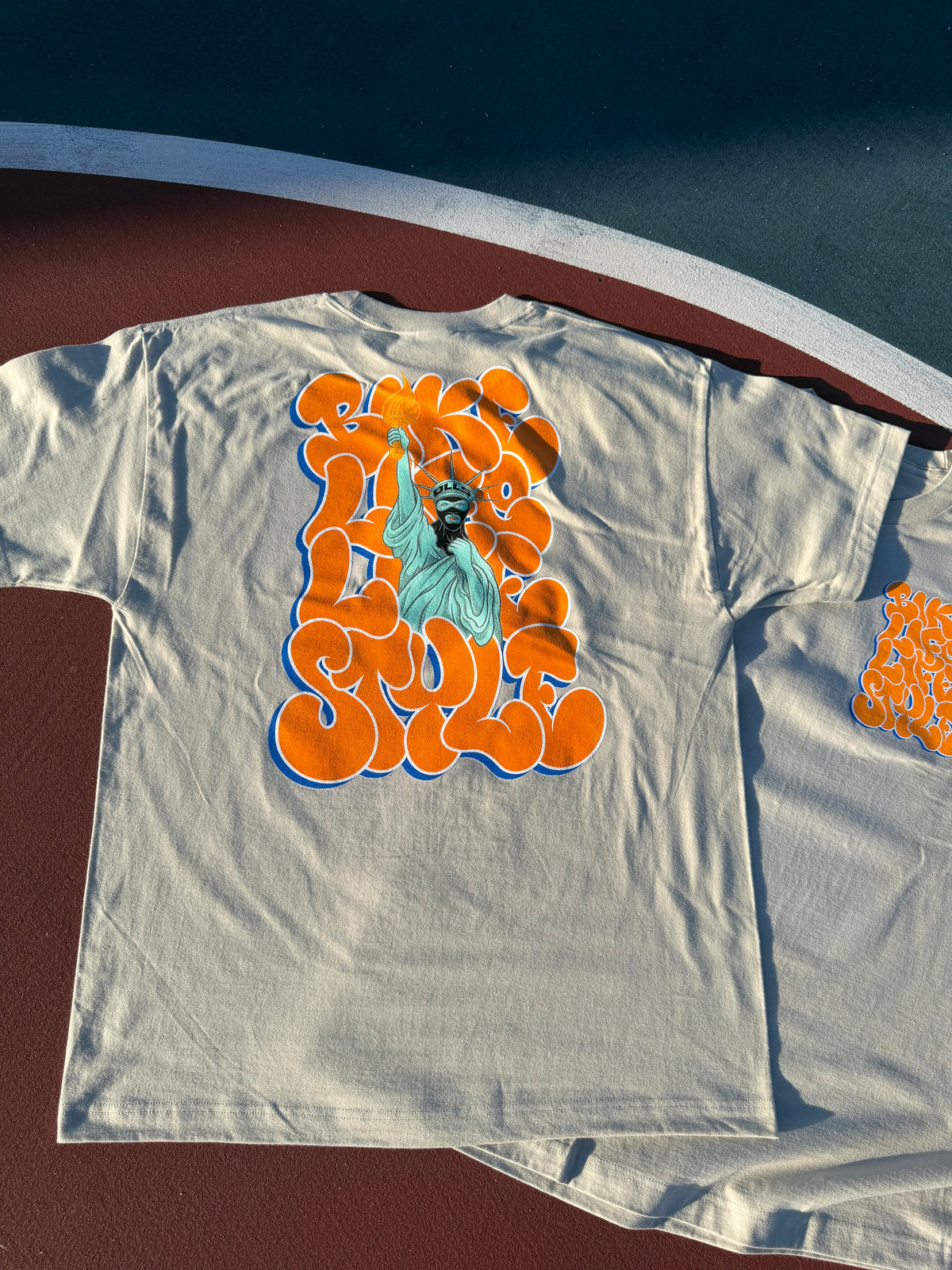 BLLS 🗽 STATUE OF BIKE LIFE SHIRT (SAND)